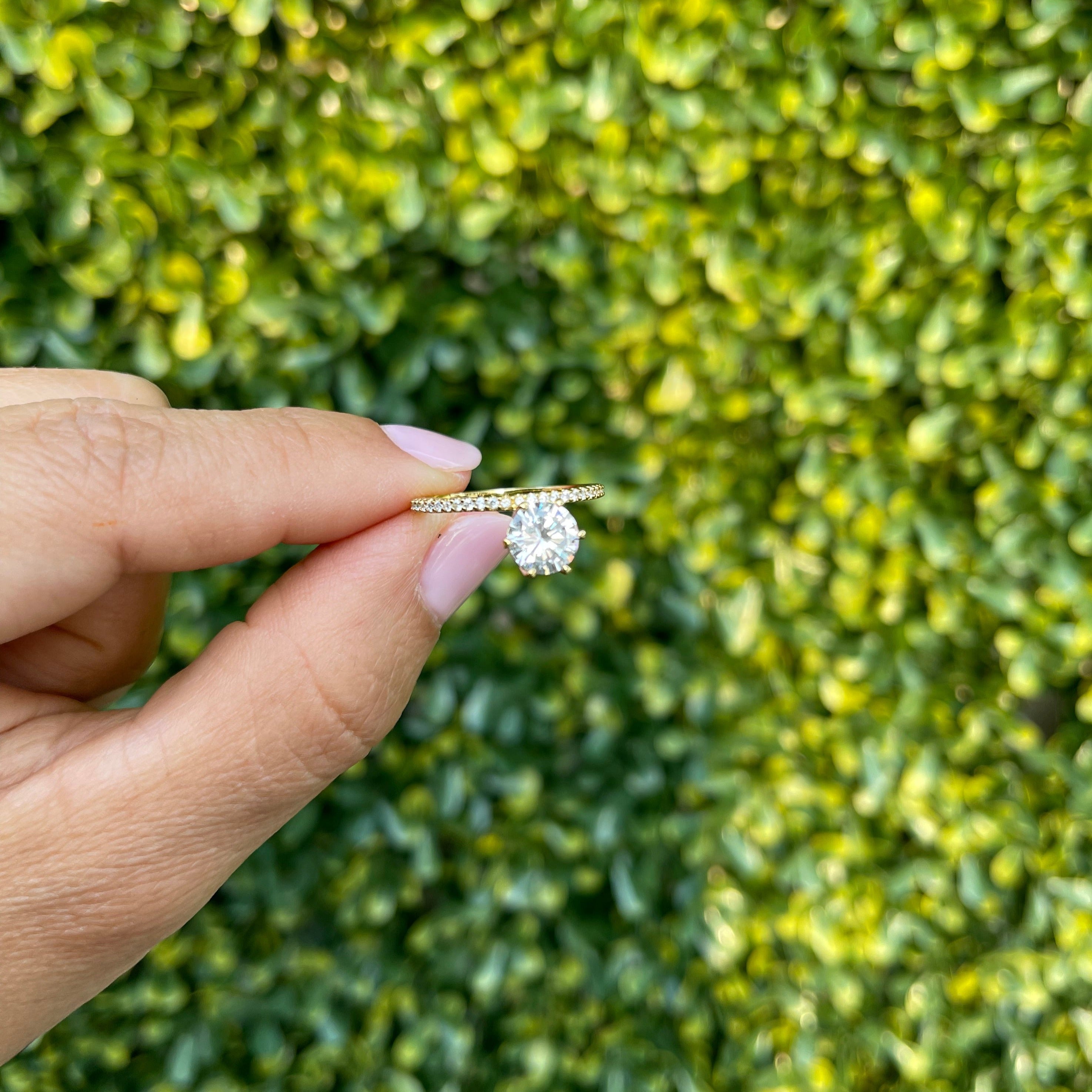 Bowing Solitaire Ring